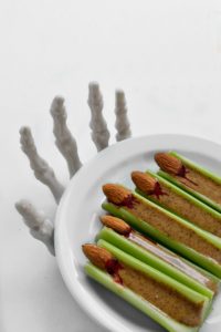 Save all that sugar for Halloween and feed your kids an almond butter and celery Healthy Witches Fingers treats. Don't forget the almond fingernails!