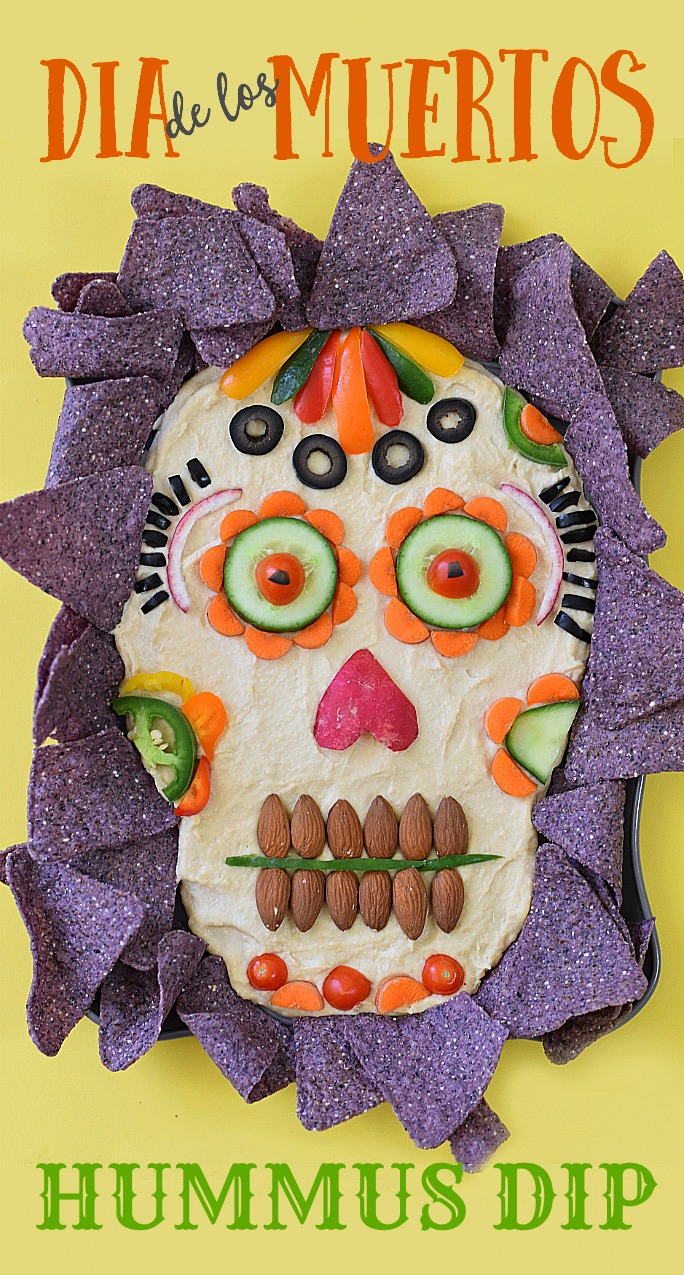 This healthy appetizer idea of Dia de los Muertos Hummus Dip is dressed to impress your guests for your next Halloween party!
