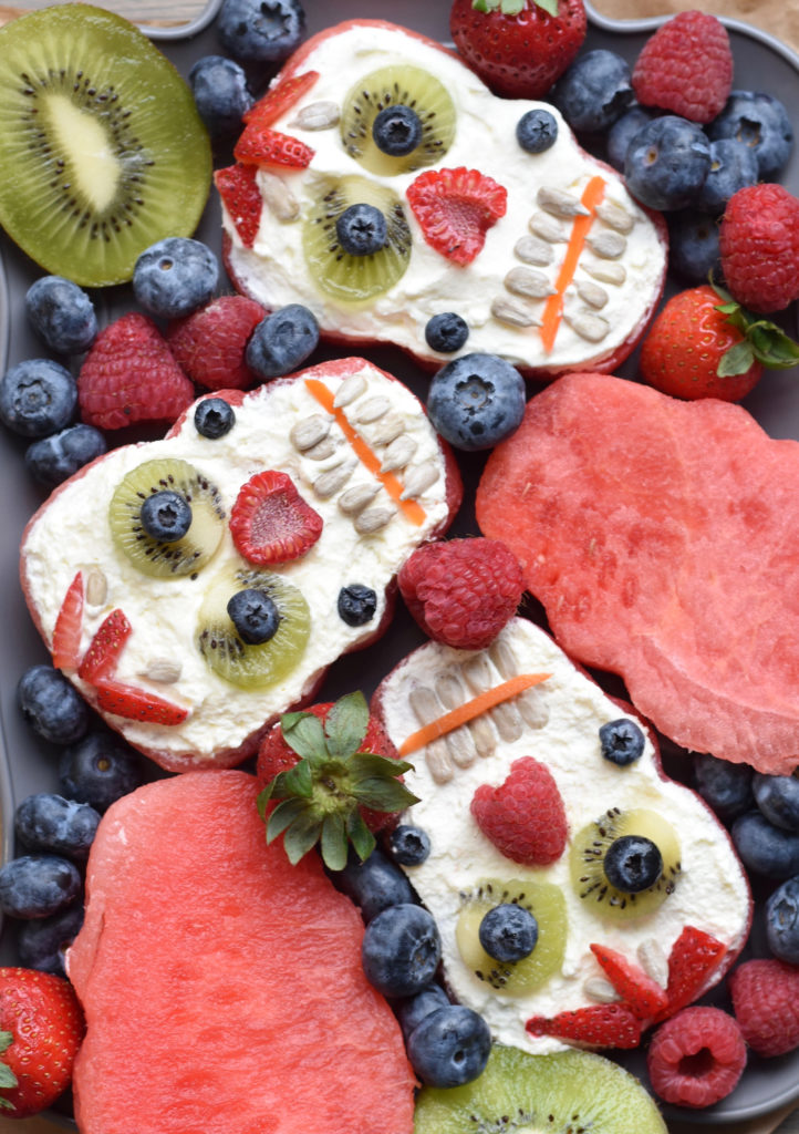 Giving your kids nutritious snack over the holiday can be possible (and still fun!) with these Refined Sugar Free Watermelon Skulls! #kidfood #kidshalloween