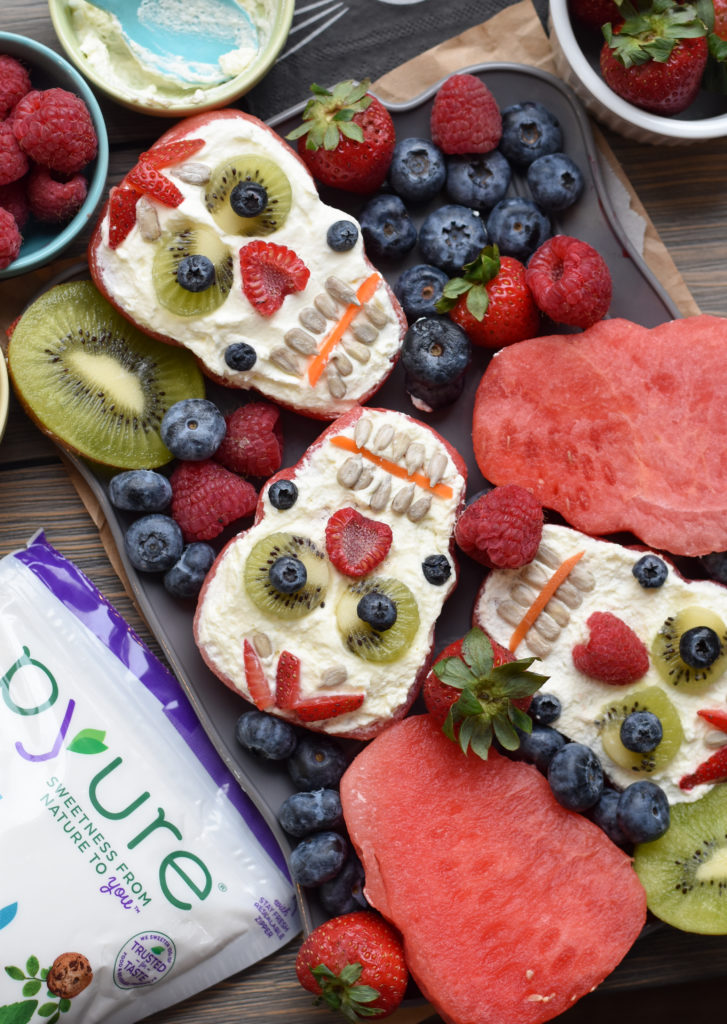 Giving your kids nutritious snack over the holiday can be possible (and still fun!) with these Refined Sugar Free Watermelon Skulls! #kidfood #kidshalloween