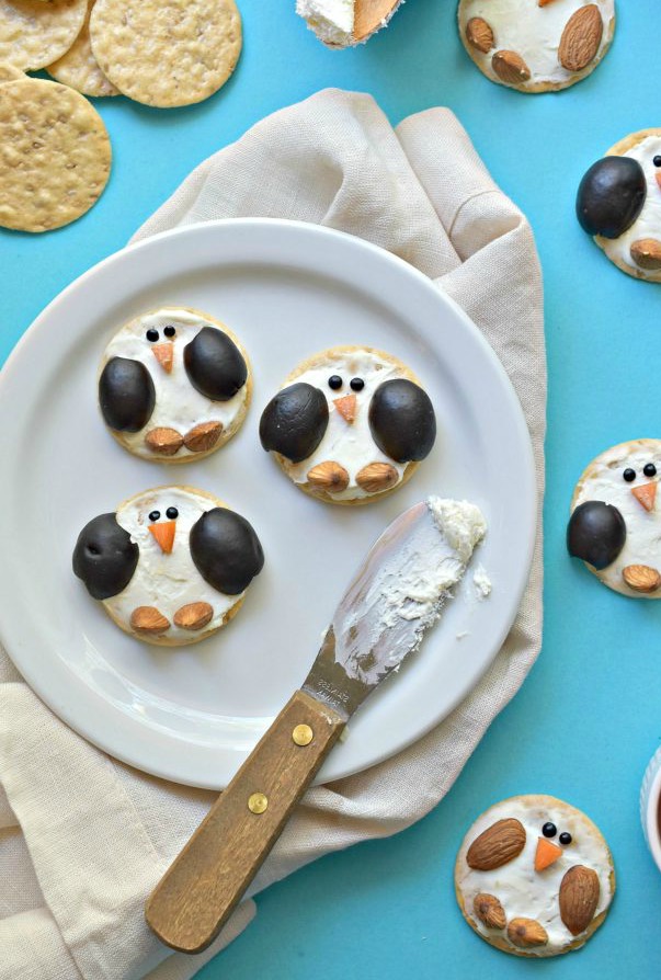 Make your winter snacking into something festive by turning crackers and cream cheese into Winterland Penguin Crackers. 