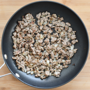 a skillet with ground turkey meat