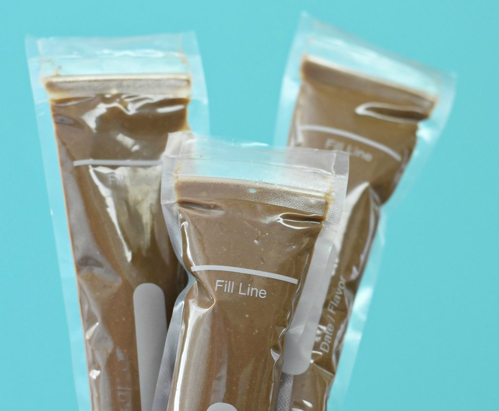 Packets of chocolate pudding