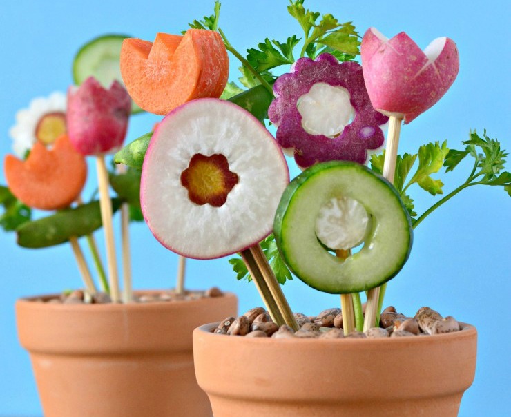 Terra cotta pots with veggies made to look like flowers