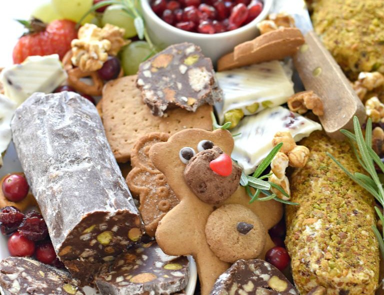 A platter of sweets (chocolate salami, bear cookies, and fruit) for a beautiful Dessert Charcuterie spread