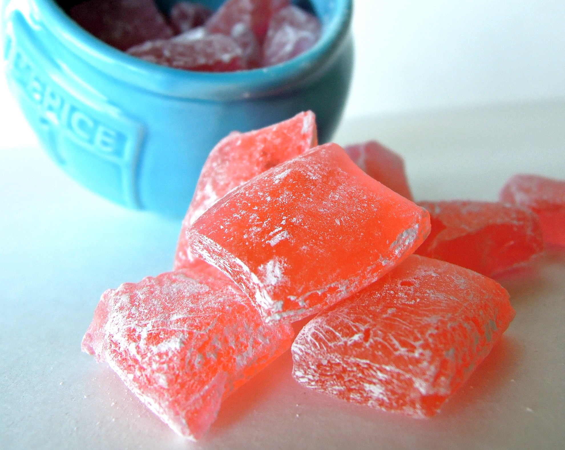 Homemade watermelon candies piled on top of each other