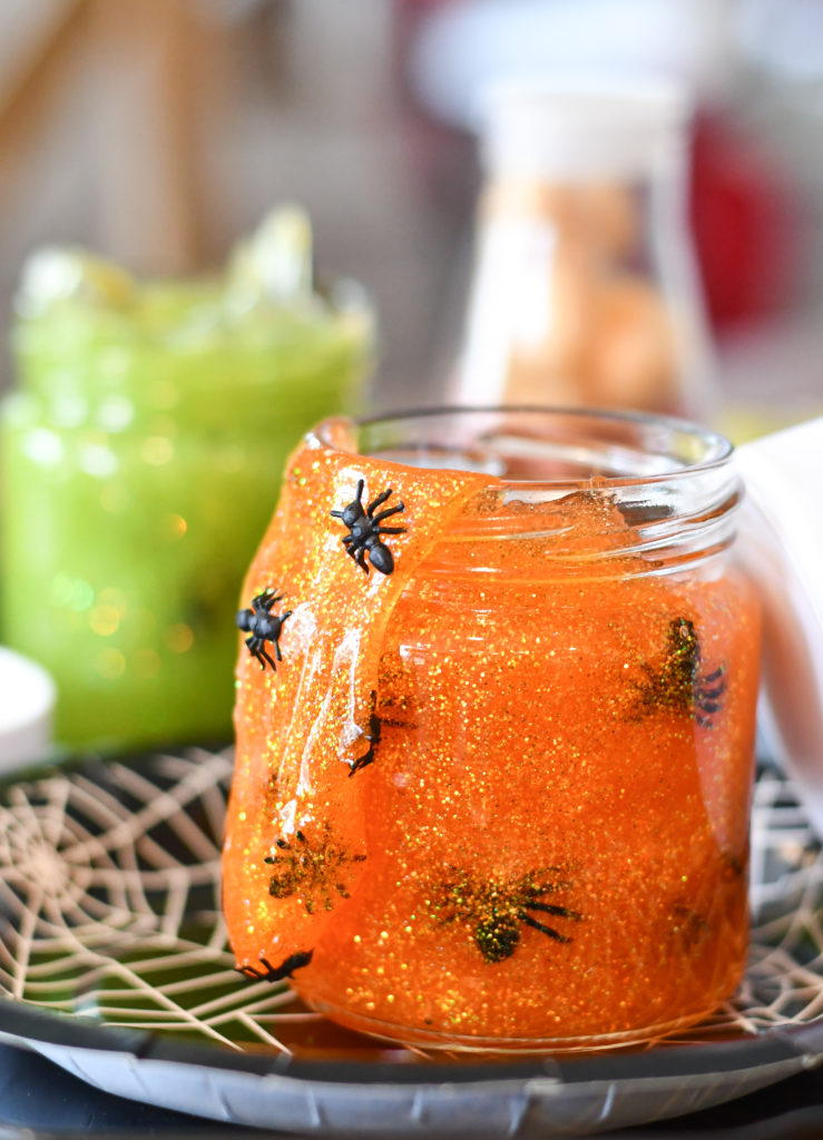 A jar of orange halloween slime