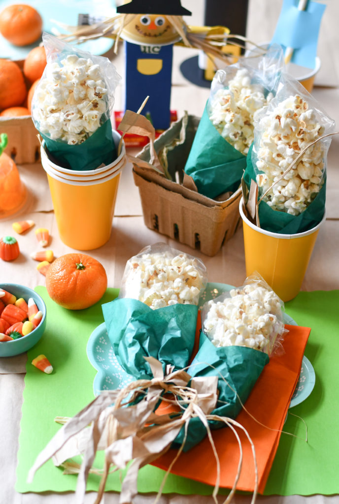 A table scene for thanksgiving of Popcorn on the Cob snack bags