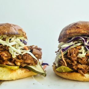 Two Pulled BBQ Jackfruit Sandwiches sitting side by side of each other